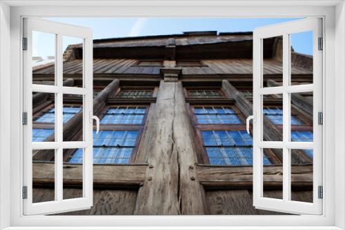 Fototapeta Naklejka Na Ścianę Okno 3D - Facade of an old Medieval wooden house in the center of Bruges, an Unesco World Heritage Site in Flanders, Belgium, Europe