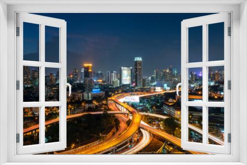 Fototapeta Naklejka Na Ścianę Okno 3D - Expressway and the city of Bangkok landscape evening  top view