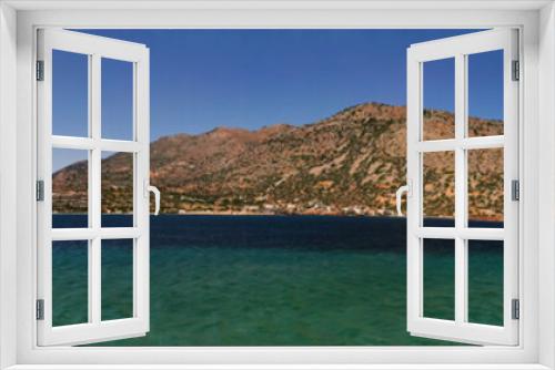 Fototapeta Naklejka Na Ścianę Okno 3D - Beautiful blue sea landscape against hill formed as island panorama of Crete, Greece, Europe