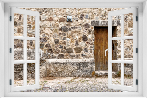 Fototapeta Naklejka Na Ścianę Okno 3D - Wooden Door And Stone Wall - Antigua - Guatemala