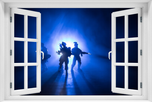 Fototapeta Naklejka Na Ścianę Okno 3D - Anti-riot police give signal to be ready. Government power concept. Police in action. Smoke on a dark background with lights. Blue red flashing sirens. Dictatorship power