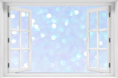 Shiny blurred blue background with bokeh for a festive mood. Greeting card template for fun.