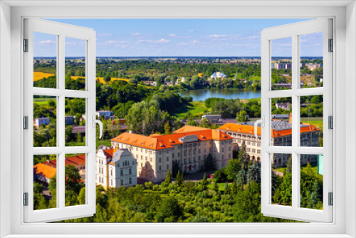 Fototapeta Naklejka Na Ścianę Okno 3D - Panoramic aerial view of historic city center with Primate Seminary clerical complex and Jezioro Swietokrzyskie Lake in Gniezno, Poland