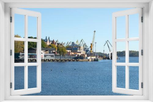 Fototapeta Naklejka Na Ścianę Okno 3D - View of the Vyborg cargo port on an October day. Leningrad region