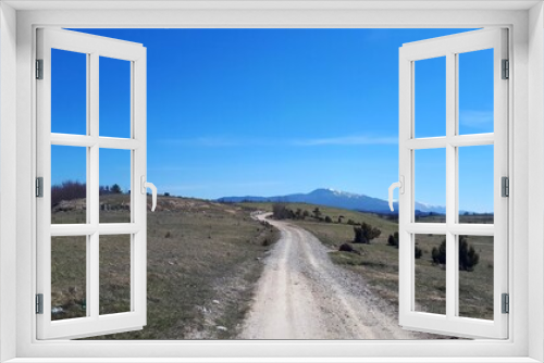 Fototapeta Naklejka Na Ścianę Okno 3D - View of rural mountain carriageway