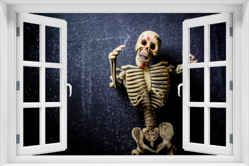 Fototapeta Naklejka Na Ścianę Okno 3D - human skeleton isolated on black background. Skeletons pose