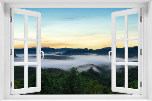 Fototapeta Naklejka Na Ścianę Okno 3D - Beautiful views of mountains in the mist at sunrise time, Ranong