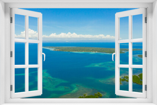 Fototapeta Naklejka Na Ścianę Okno 3D - Aerial view of tropical Islands with beaches in the blue sea against the sky and clouds.