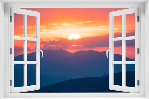 Fototapeta Naklejka Na Ścianę Okno 3D - Orange Sky and Purple mountains during a Sunset in Athens, Greece