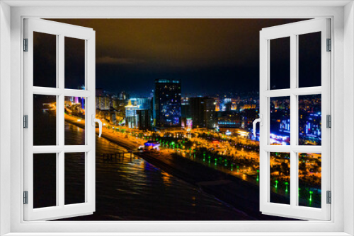 Fototapeta Naklejka Na Ścianę Okno 3D - View of the night city from a drone
