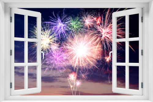 Fototapeta Naklejka Na Ścianę Okno 3D - Beautiful bright fireworks lighting up twilight sky outdoors