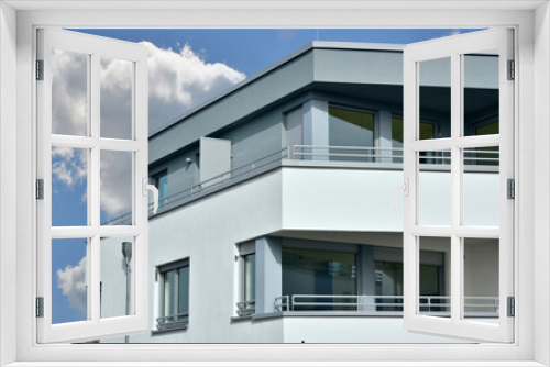 Fototapeta Naklejka Na Ścianę Okno 3D - Fassade eines neu gebauten modernen Mehrfamilien-Wohnhauses