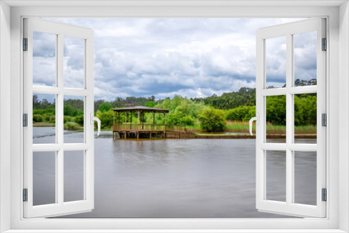 Fototapeta Naklejka Na Ścianę Okno 3D - Small wooden construction inside a lake. Pateira de Fermentelos, Agueda..