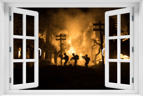 Fototapeta Naklejka Na Ścianę Okno 3D - War Concept. Military silhouettes fighting scene on war fog sky background, World War Soldiers Silhouette Below Cloudy Skyline At night. Battle in ruined city. Selective focus