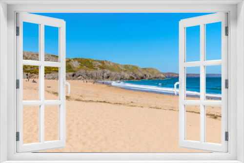 Fototapeta Naklejka Na Ścianę Okno 3D - A view across Barafundle beach on the Pembrokeshire coast, South Wales in springtime