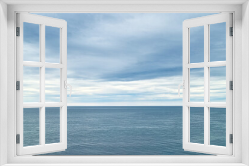 Fototapeta Naklejka Na Ścianę Okno 3D - 柔らかな光に包まれる朝の海