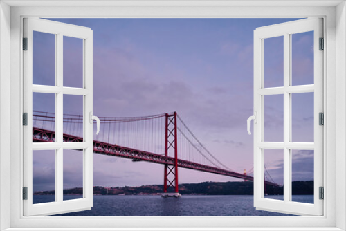 Fototapeta Naklejka Na Ścianę Okno 3D - Beautiful landscape with suspension 25 April bridge bridge over the Tagus river in Lisbon, Portugal.