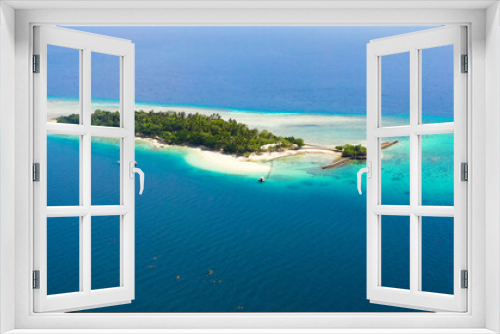 Fototapeta Naklejka Na Ścianę Okno 3D - Top view of small tropical Little Liguid Island in the blue sea with a coral reef and the beach. Little Cruz Island, Philippines, Samal.