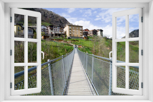 Fototapeta Naklejka Na Ścianę Okno 3D - Suspension bridge in the mountains