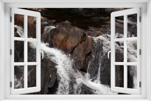 Fototapeta Naklejka Na Ścianę Okno 3D - Stream cascading through rocks ourdoors