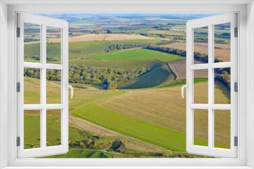 Fototapeta Naklejka Na Ścianę Okno 3D - Paragliding above the fields at Monks Down in Wiltshire