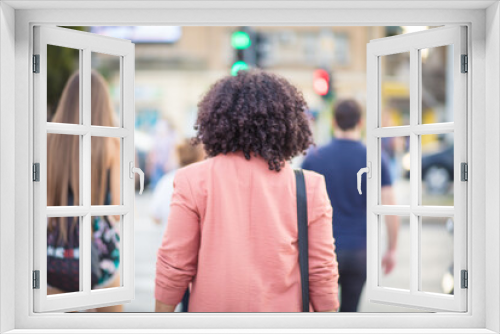 Business woman walking on the street.