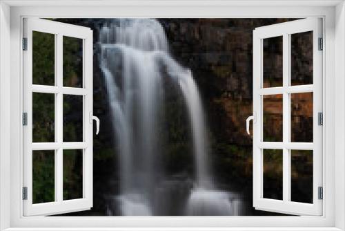 Fototapeta Naklejka Na Ścianę Okno 3D - Beautiful slow shutter waterfall in Nelspruit South Africa, Water Cascading down a mountain side over the rocky terrain