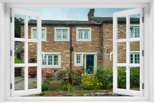 Fototapeta Naklejka Na Ścianę Okno 3D - Facade of a typical cottage style in the county of Cumbria, UK