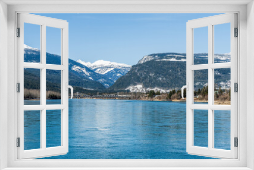 Fototapeta Naklejka Na Ścianę Okno 3D - early spring Columbia river panorama with snow on mountains blue sky British Columbia Canada