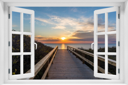 Fototapeta Naklejka Na Ścianę Okno 3D - Holzsteg zum Meer bei Sonnenuntergang