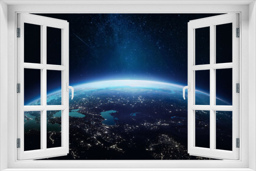 Fototapeta Naklejka Na Ścianę Okno 3D - Planet Earth at night in the outer space. Earth surface. Abstract wallpaper with space and stars. City lights on planet. Elements of this image furnished by NASA
