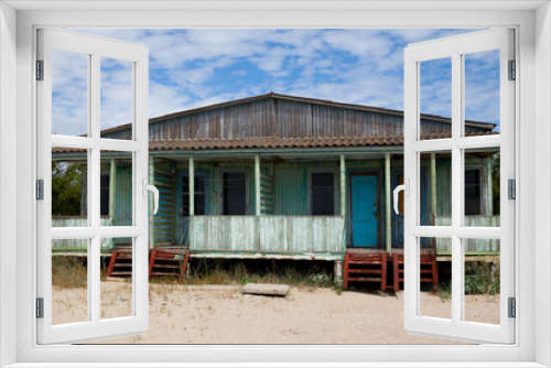 Fototapeta Naklejka Na Ścianę Okno 3D - Old wooden beach house.