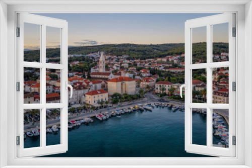 Fototapeta Naklejka Na Ścianę Okno 3D - Picturesque scenic view on Supetar on Brac island, Croatia. Aerial drone view in august 2020