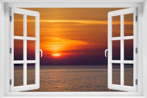 Fototapeta Naklejka Na Ścianę Okno 3D - Scenic sunset over calm sea