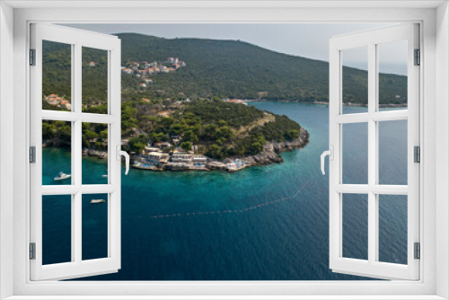 Fototapeta Naklejka Na Ścianę Okno 3D - Aerial view of the Boka Kotorska, entrance into the fjord of Montenegro leading to the city of Kotor. Bay of Kotor. Yacht and boats line the wild and jagged coasts. Zanjic