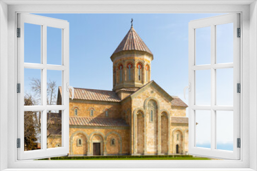 Fototapeta Naklejka Na Ścianę Okno 3D - Impressive building of new Cathedral of Agia Nina at Bodbe Convent in foothills of Caucasus Mountains on sunny spring day, Kakheti, Georgia
