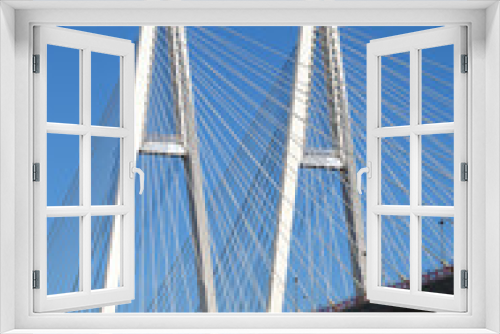 Fototapeta Naklejka Na Ścianę Okno 3D - Cable-stayed bridge against the blue sky