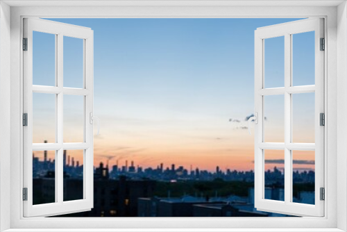 Fototapeta Naklejka Na Ścianę Okno 3D - New York City Skyline Silhouette At Dusk