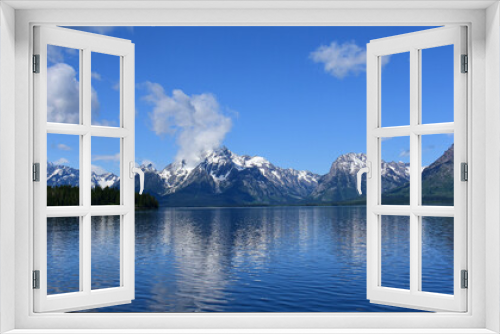 Fototapeta Naklejka Na Ścianę Okno 3D - the incredible view of the grand teton range from the colter bay swimming beach  on a sunny summer day in grand teton national park, wyoming