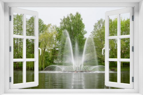 Fototapeta Naklejka Na Ścianę Okno 3D - Water fountain in the park