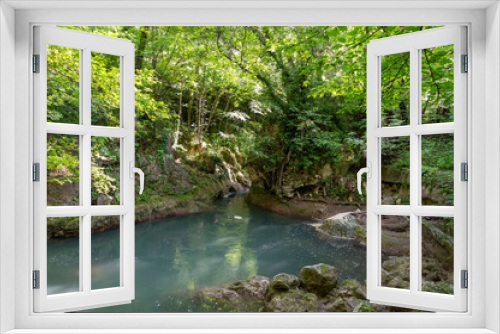 Fototapeta Naklejka Na Ścianę Okno 3D - river in the woods coming from the waterfall of the marmore