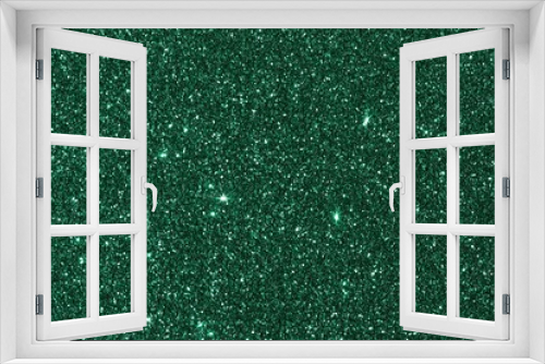 Fototapeta Naklejka Na Ścianę Okno 3D - Abstract background of shimmering green sequins with a bright glow. The atmosphere of the holiday.