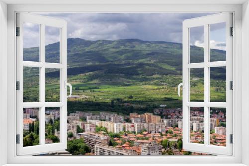 City view from above, landscape, small city and mountain