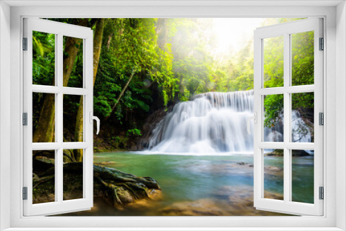 Fototapeta Naklejka Na Ścianę Okno 3D - Waterfall and blue emerald water color in Huay Mae Khamin national park. Huay Mae Khamin, Beautiful nature rock waterfall steps in tropical rainforest at Kanchanaburi province, Thailand