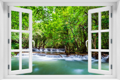 Fototapeta Naklejka Na Ścianę Okno 3D - Waterfall and blue emerald water color in Huay Mae Khamin national park. Huay Mae Khamin, Beautiful nature rock waterfall steps in tropical rainforest at Kanchanaburi province, Thailand