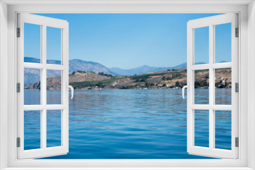 Fototapeta Naklejka Na Ścianę Okno 3D - Morning view of Lake Chelan from the waterfront at Chelan-Stehekin ferry dock - Washington state, USA