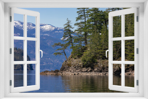 Fototapeta Naklejka Na Ścianę Okno 3D - veiw from the shore to Harrison Lake with small island and pinetrees on the beautiful background with mountains