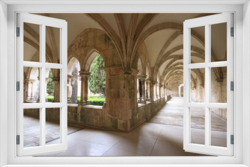 Archway of an old monastery. Cloisters of Batalha Monastery