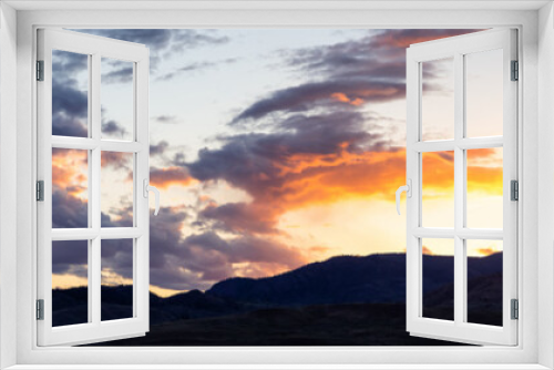 Fototapeta Naklejka Na Ścianę Okno 3D - Panoramic View of Desert Mountain Canadian Nature Landscape. Colorful Sunset Sky. Taken in Savona near Kamloops, British Columbia, Canada. Background Panorama