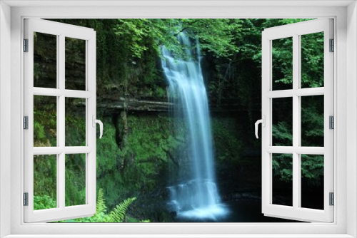 Fototapeta Naklejka Na Ścianę Okno 3D - Glencar Waterfall, a watefall located in woodland near Glencar Lough in County Leitrim, ireland